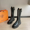 Women's cow two-layer leather Martin boots in black with rear zip, square heel, and waterproof platform