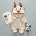 Long-sleeved baby romper with front lace-up strap closure in a khaki colour.
