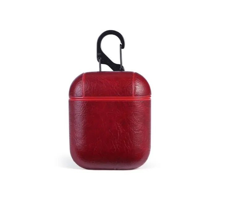 Genuine leather protective case for Apple Airpods charging box in black, brown, light brown, and red.