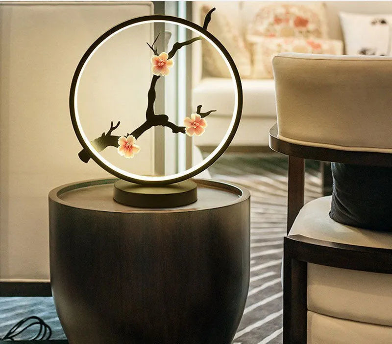 Chinese style ceramic LED table lamp, matte black, with glass lampshade on side table