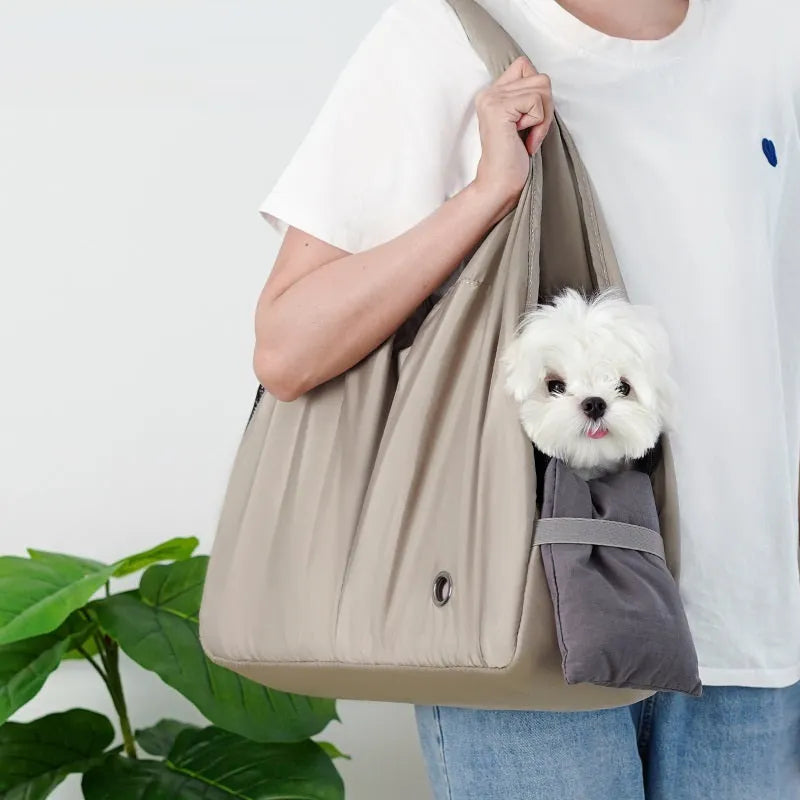 Apricot coloured cloth pet handbag with dimensions 41cm by 16cm by 28cm