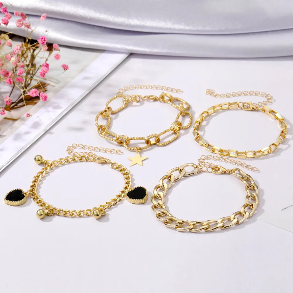 Black peach heart bracelet with multi-layer alloy chain, five-pointed star and heart charms, retro simple design