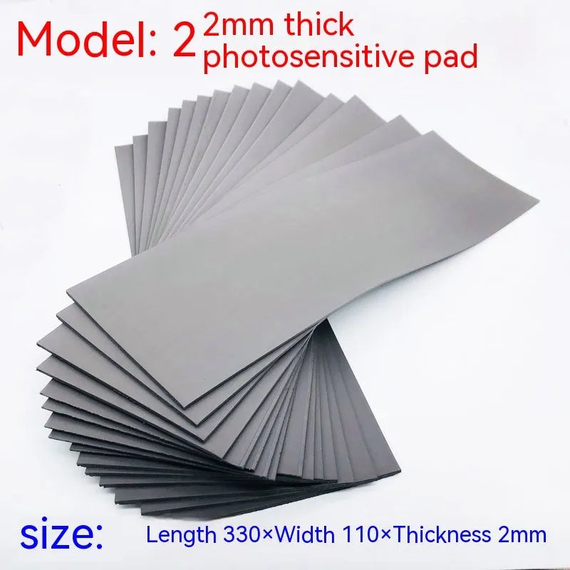 Black and grey plastic photosensitive seal mat for pottery, showing 7mm, 4mm and 2mm thickness options.