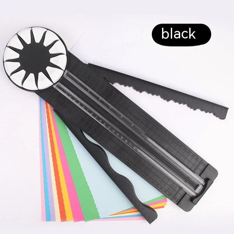 Pink and black 12-in-1 multifunctional plastic paper cutting machine on a desk