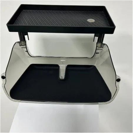 Black ABS plastic storage box fitted under the touchscreen of a Tesla Model Y interior.
