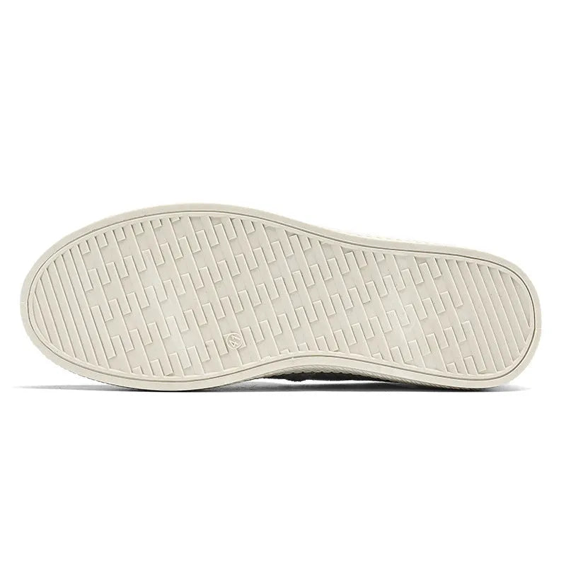 Men's beige linen cloth shoes with canvas upper and PVC sole on a plain background.