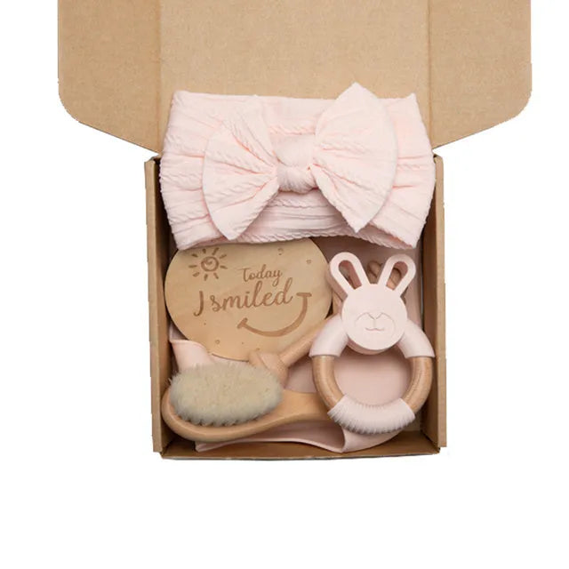 Set of six baby bath toys in peach, blue, and brown colours made from wood and chemical fibre