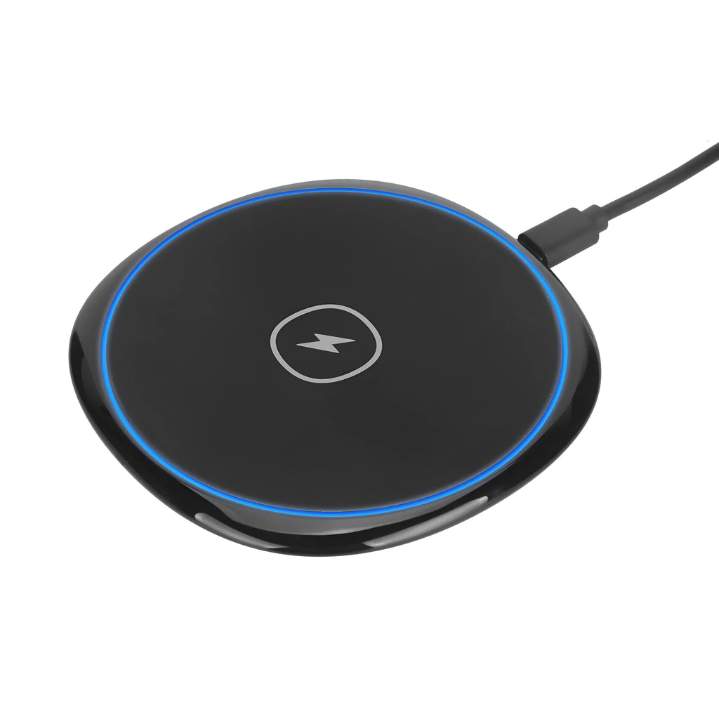 Black 15W fast wireless charger on a desk, glossy surface with indicator light
