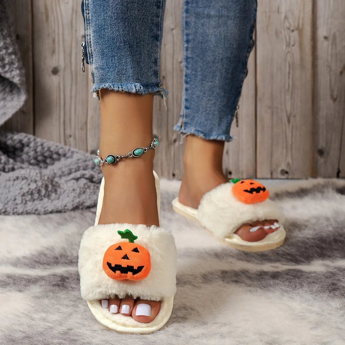 Women's white and yellow pumpkin cartoon plush open toe slippers on anti-slip PVC sole.