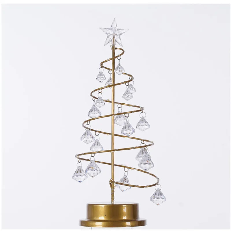 Gold crystal Christmas tree LED light with warm glow, star topper, 33cm tall, on a tabletop