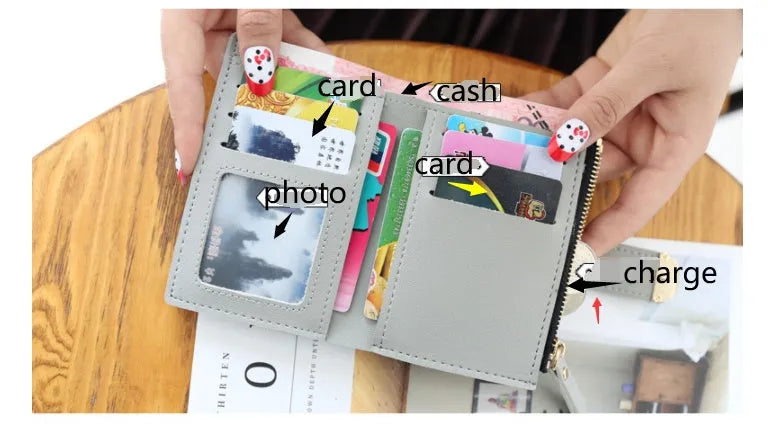 Buckle ring women's wallet in PU leather, 12 x 9 cm, shown in one of seven colours