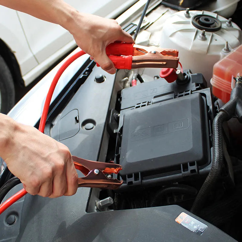 Black and red car battery jump starter cables with battery clips on 2 metre cables