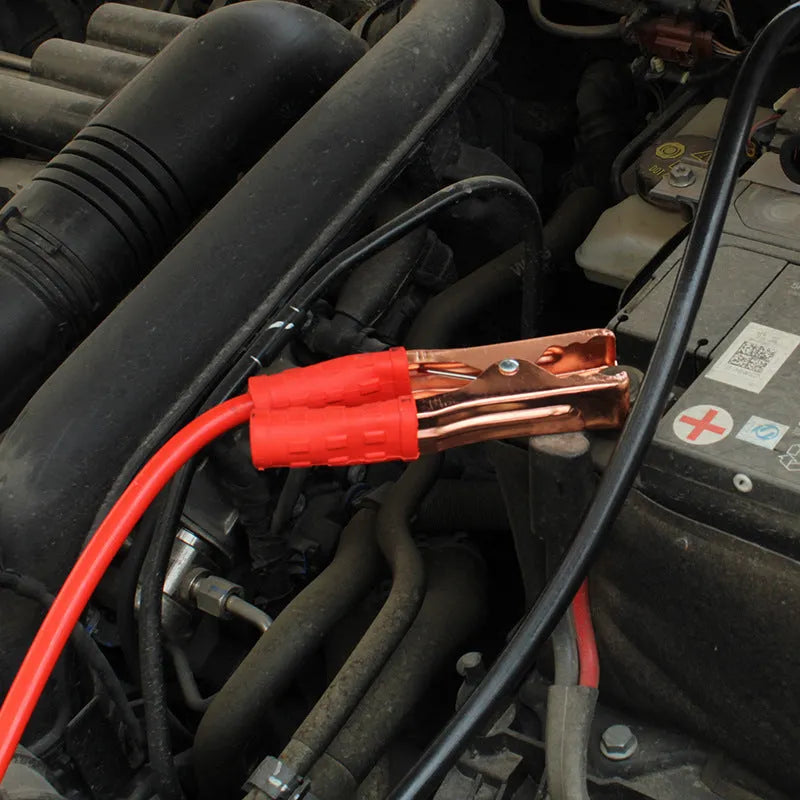 Black and red car battery jump starter cables with battery clips on 2 metre cables