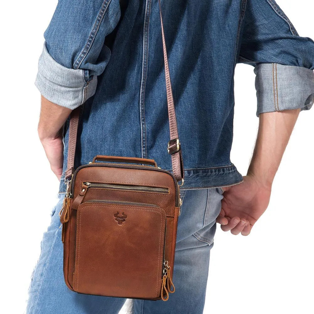 Men's brown Crazy Horse leather crossbody bag with sewing line details and shoulder strap