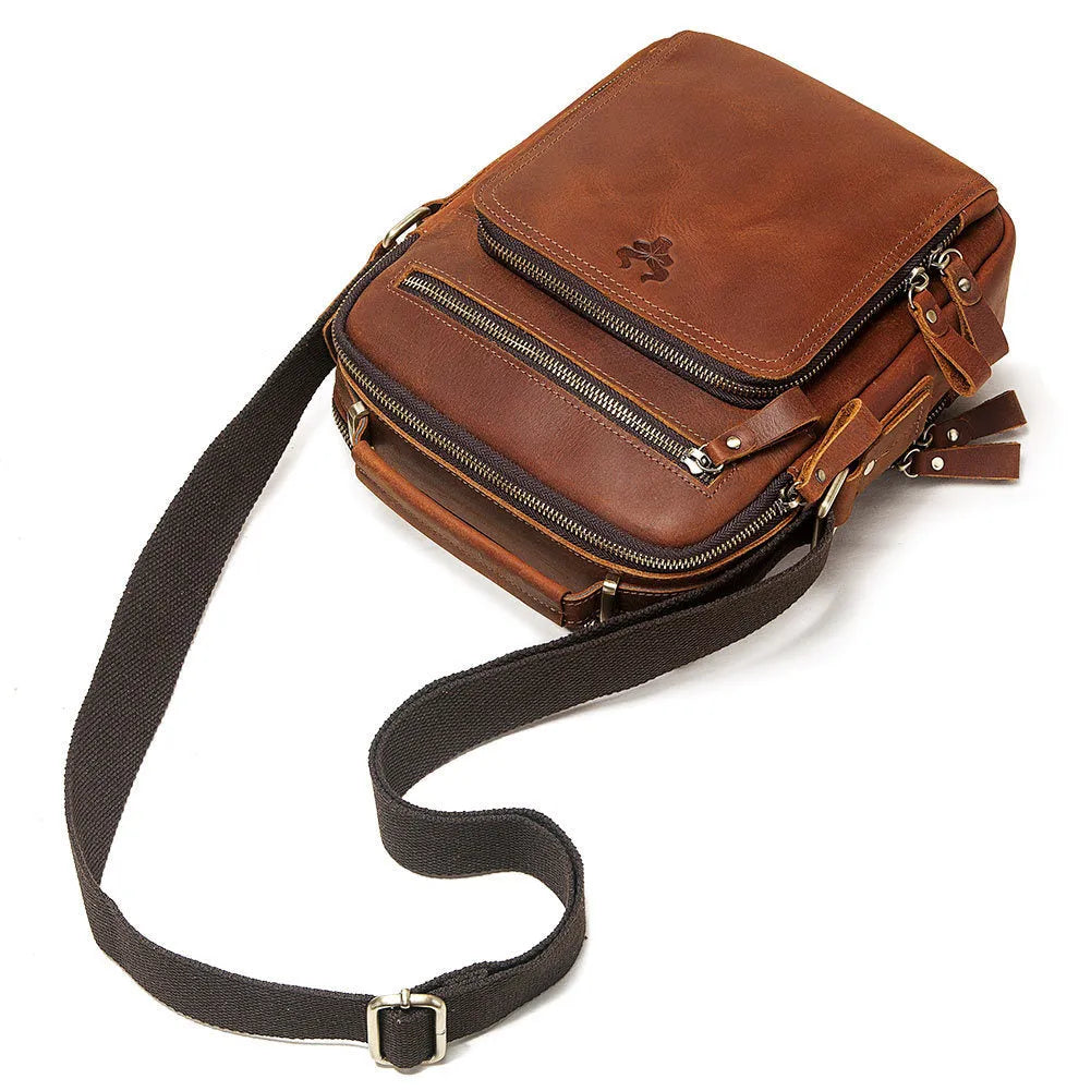 Men's brown Crazy Horse leather crossbody bag with sewing line details and shoulder strap
