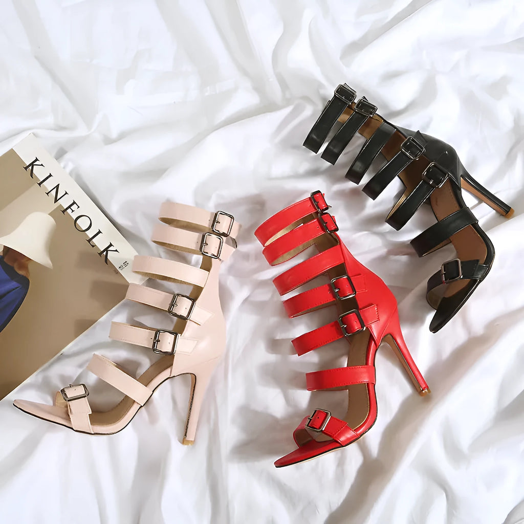Women's high tube belt buckle high heel sandals in black with Roman boot style and ankle strap