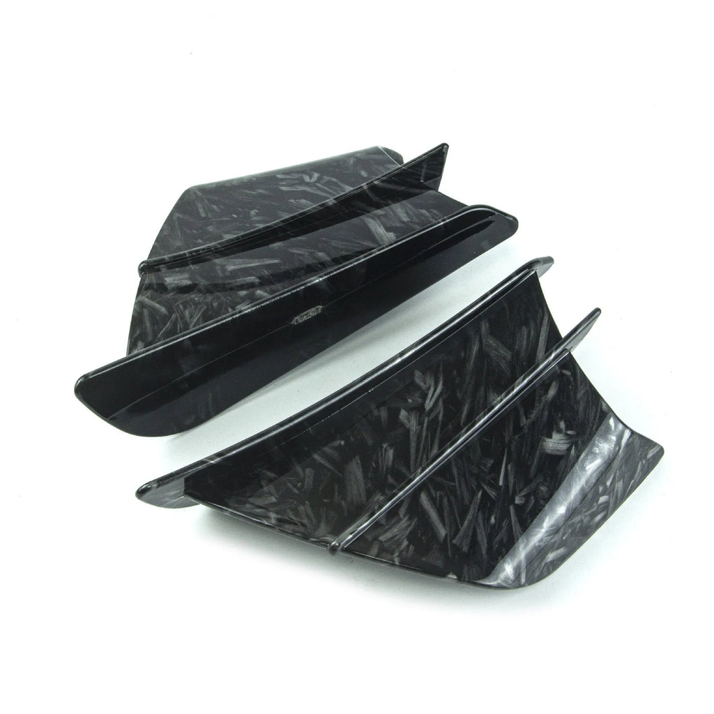 Set of two universal motorcycle spoiler wings for air diversion, showing four available finish options.