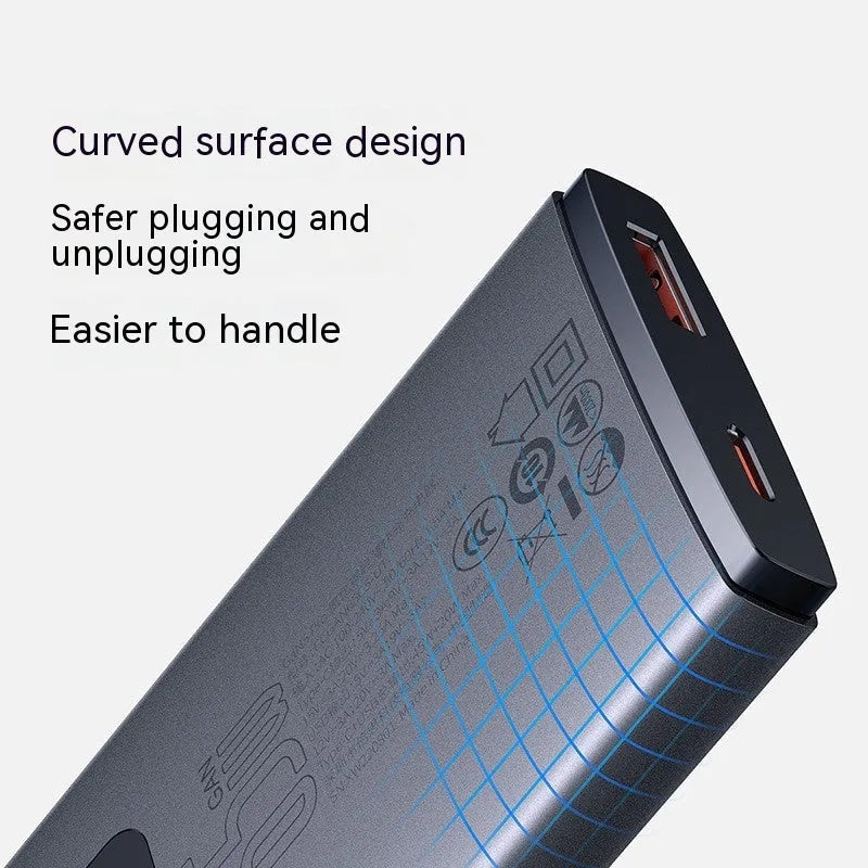 Moon shadow grey 65W GaN fast charger with Type-C cable on a desk