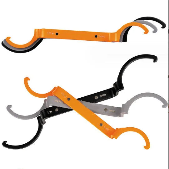 Crescent magnetic suction and catheter locking wrench three-piece set in orange, grey, and black colours
