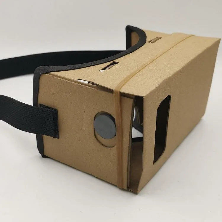 Foldable pink and white VR cardboard glasses headset for smartphones with adjustable strap and 3D lenses.