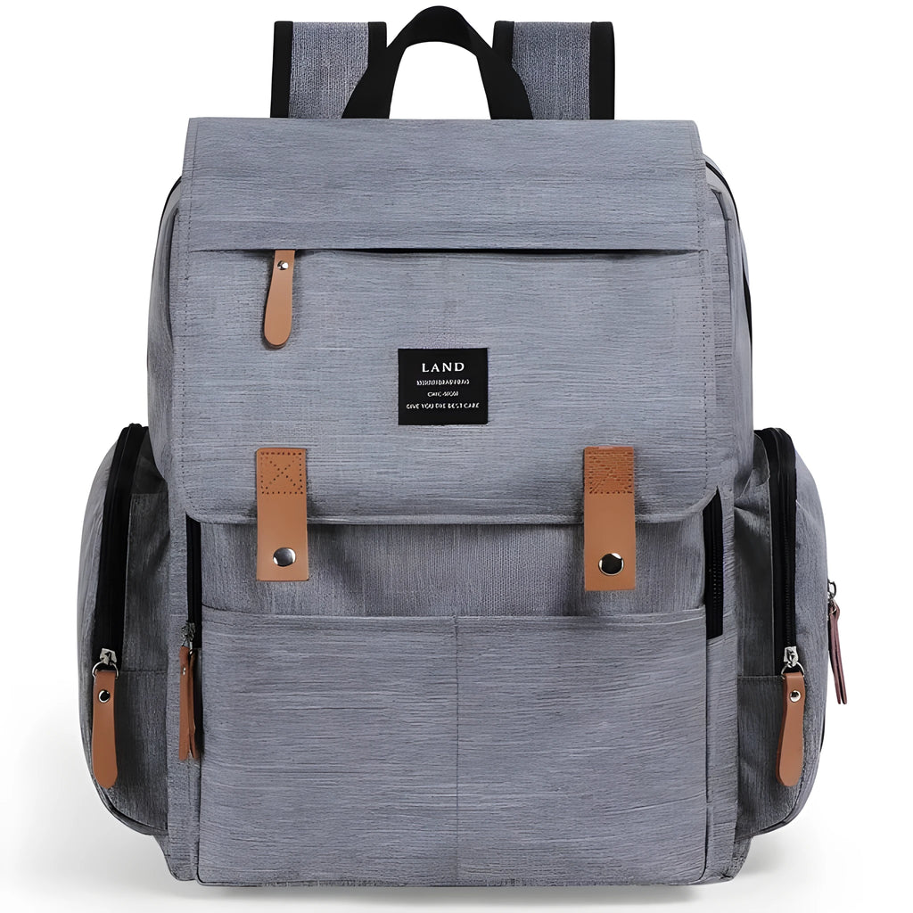 LAND Mommy large grey Oxford cloth diaper backpack with changing mat, shown on a table