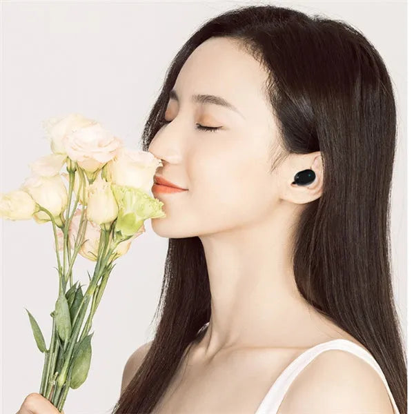 M1 Bluetooth wireless earbuds in black and white colours with 10m range