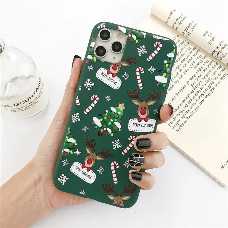Green TPU phone case with cartoon Christmas elk, Christmas tree, and striped design for Apple iPhone.