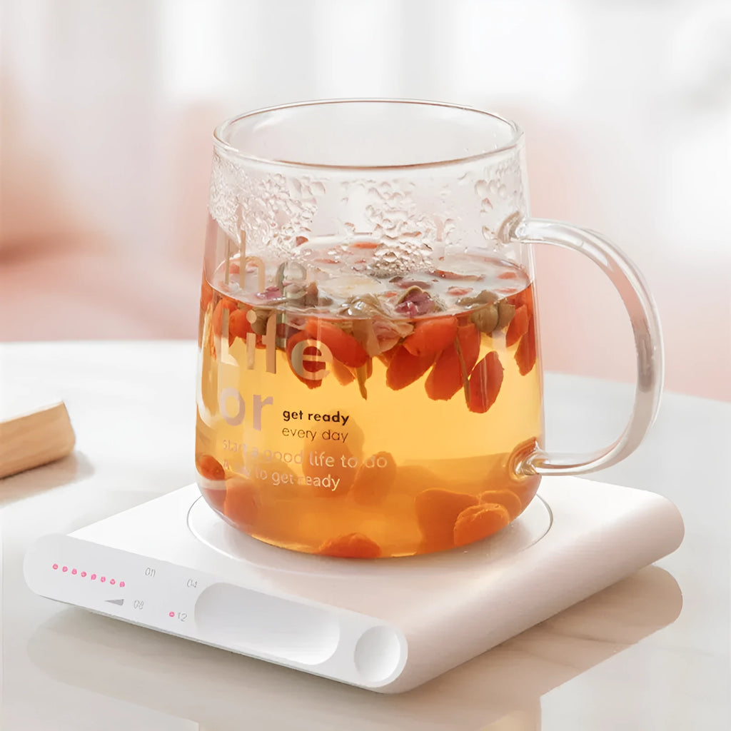 Pink USB heating cup pad with touch controls and automatic timer function