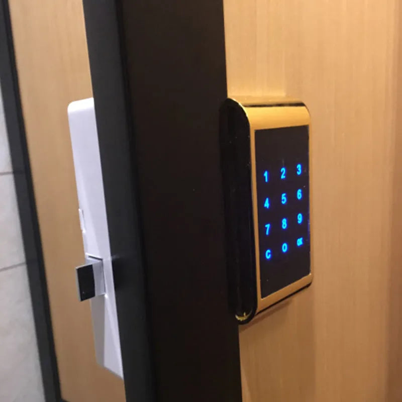 Silver and gold zinc alloy temporary deposit code lock showing compact dimensions and battery compartment