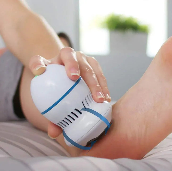 Beige and white electric foot file grinder with USB cable and grinding heads