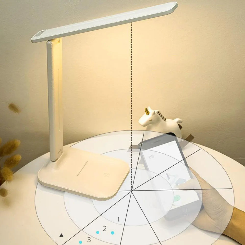White plastic touch dimming bedside lamp with USB charging port.