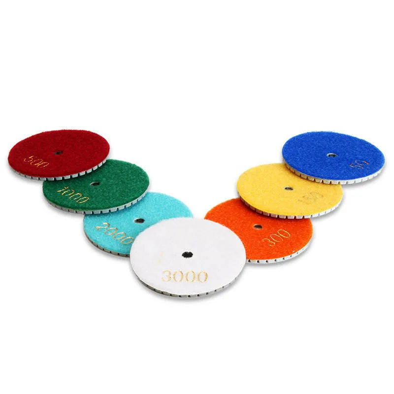 10 emery stone polishing pads in assorted grits with 80mm diameter and 10mm centre holes