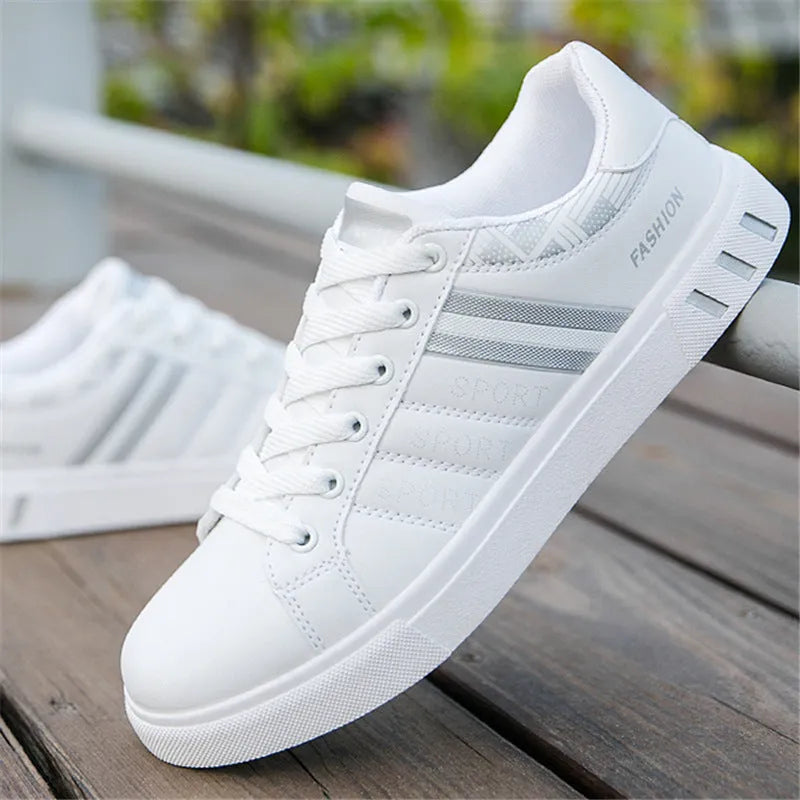 Unisex black sports shoes on a white background, showing the sole, with a sizing chart for codes 39 to 44 visible.