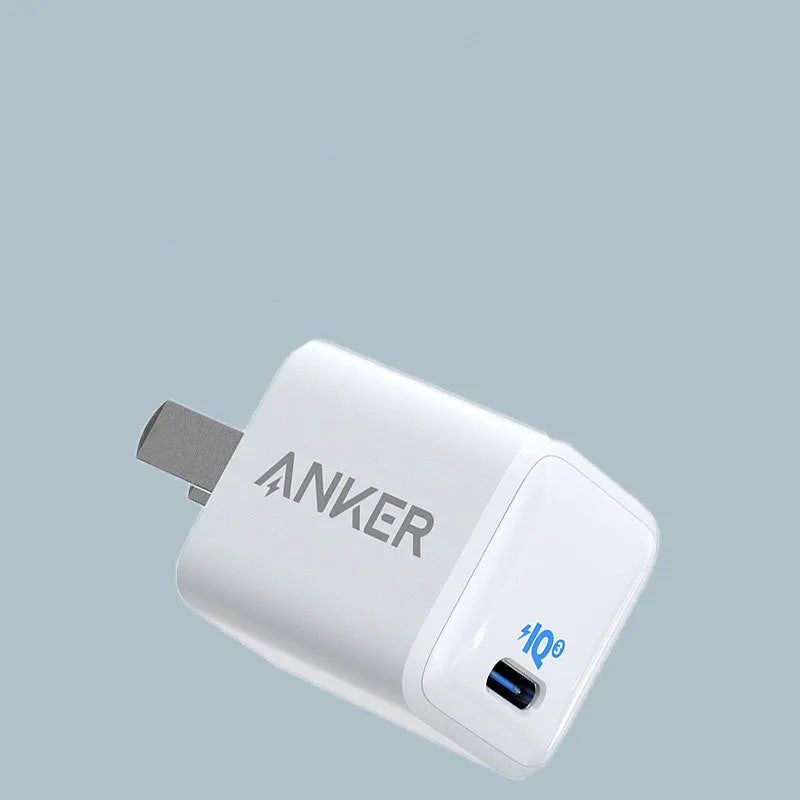 White 18W USB travel charger with UK three-pin plug for mobile phones