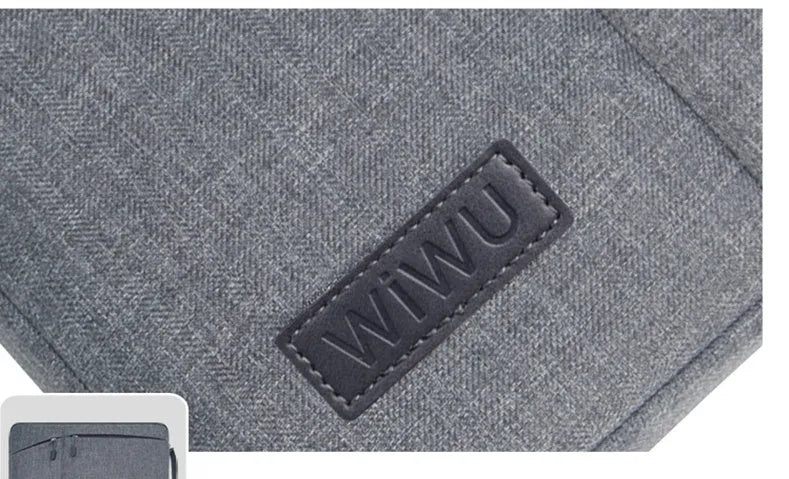 Shockproof nylon laptop case with zipper and multiple internal compartments in black