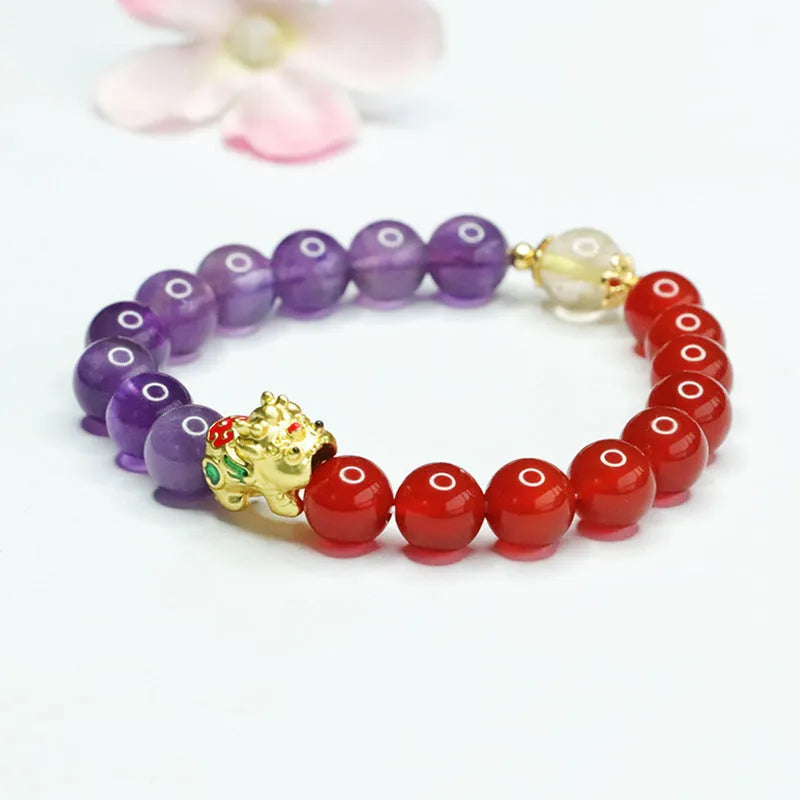 Close-up of an amethyst and red agate beaded bracelet in Chinese style with 8mm stone beads.