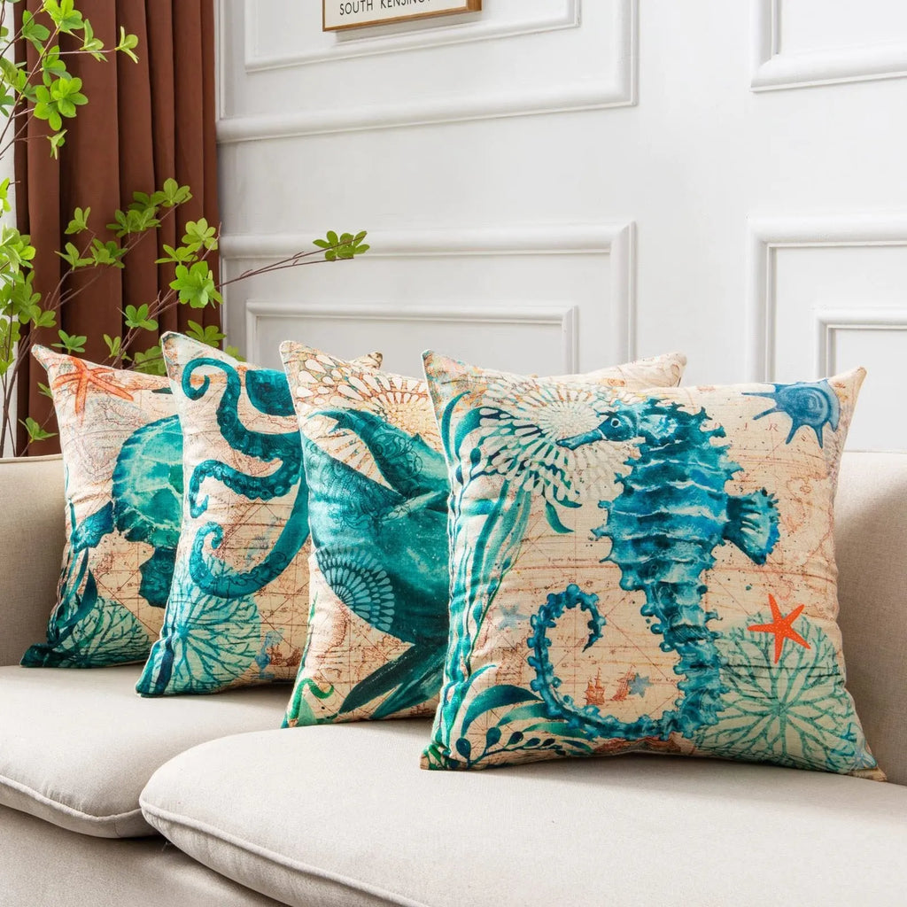 Square linen cushion cover with blue sea turtle print, showing invisible zipper closure.