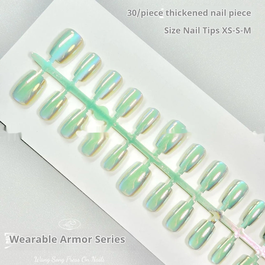 Electroplated Cat's Eye aurora effect false nail set in short ladder sizes on a display card.