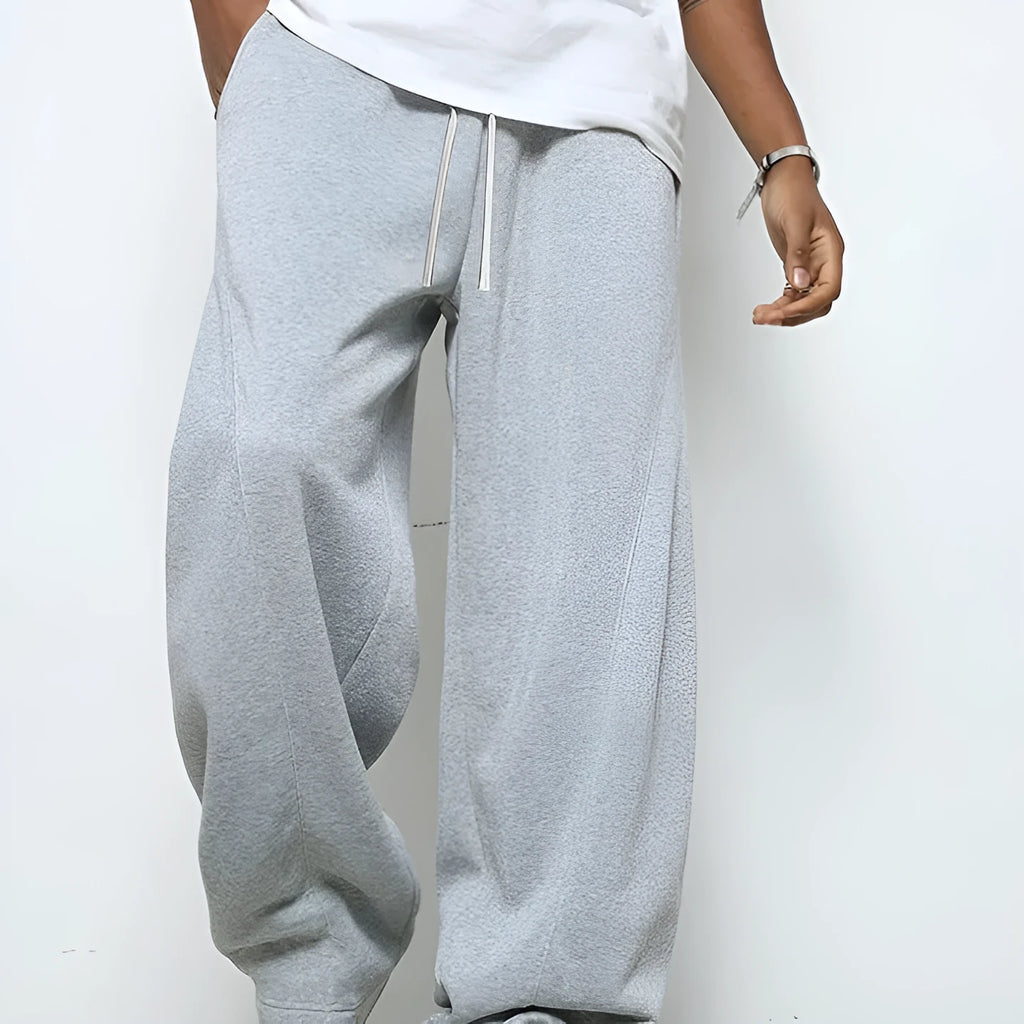 Men's straight-leg casual trousers in black with a drawstring waistband