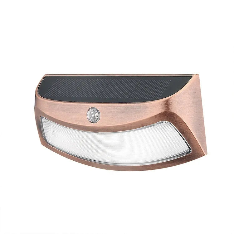 Solar outdoor wall light with smiling face design for garden decoration