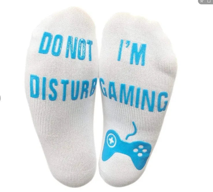 Cotton dispensing socks with 3D letter print, shown in black, blue, and white, with short, medium, and long tube lengths