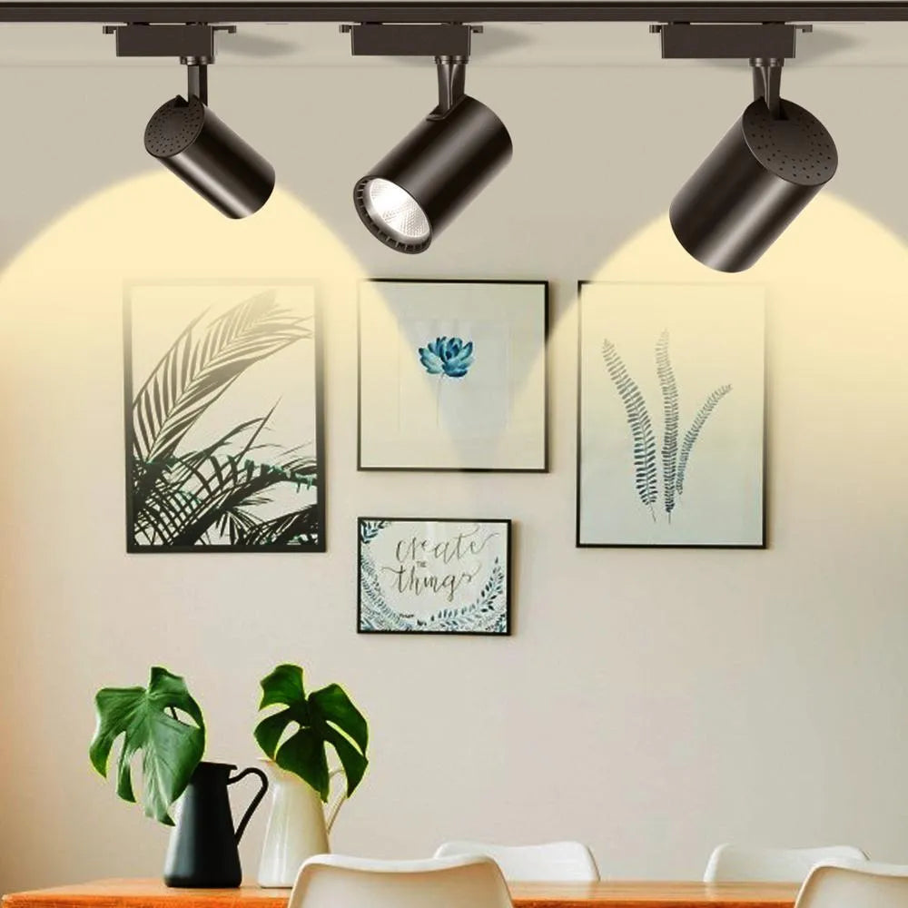 Black LED track spotlight with narrow beam angle for jewellery display lighting