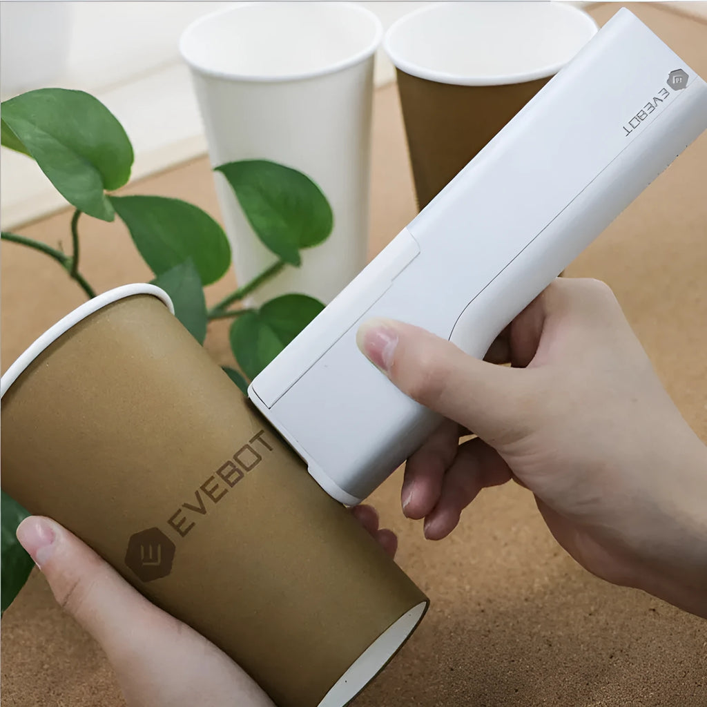 White handheld portable printer with 300dpi accuracy, 26mm print width, Type-C port, and navy blue ink cartridge