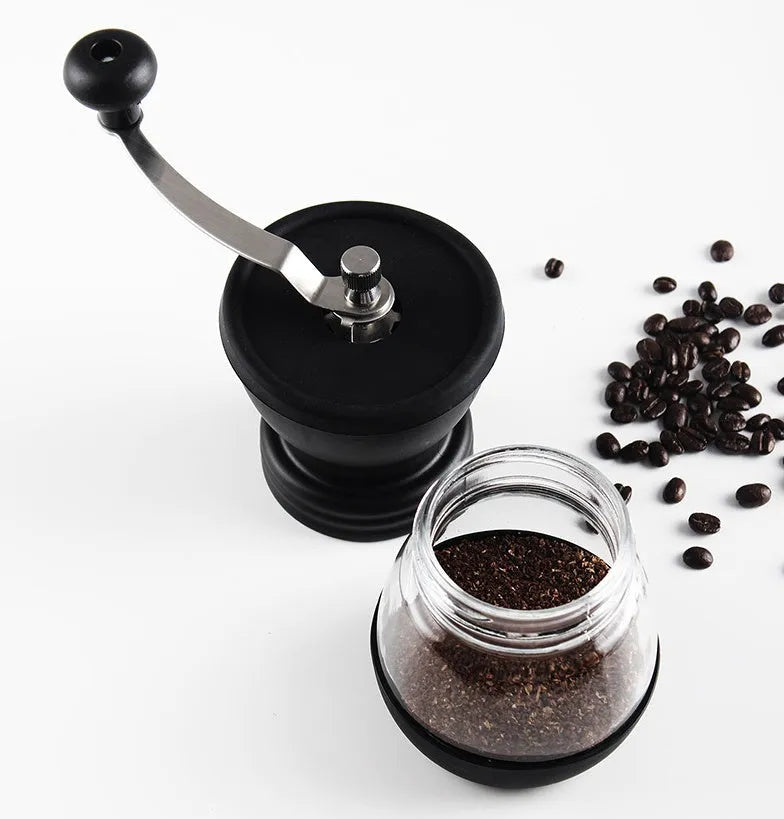 Manual hand coffee grinder with black format, beech wood body, 88 mm width and 160 mm height, front drawer for ground coffee