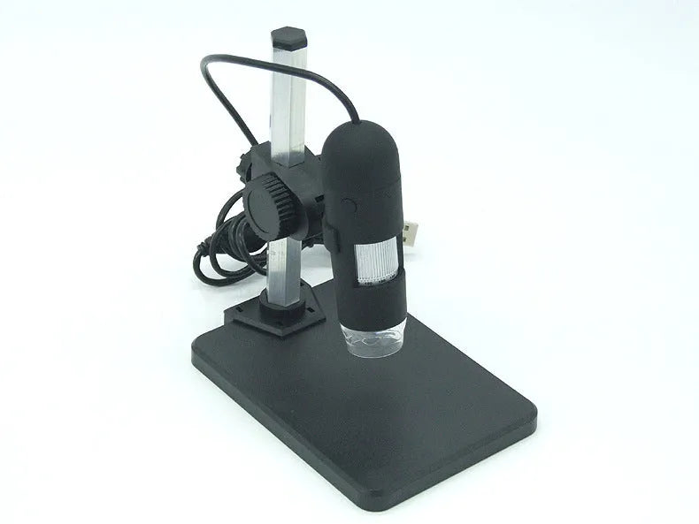USB microscope camera with 8 white-light LEDs and manual focus ring, black casing, on white background