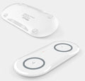 Black and white dual wireless charging pad showing two phone charging positions with Type-C cable