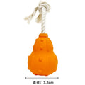 Natural rubber stuffable dog chew toy with a long strap for fetching and treat dispensing.
