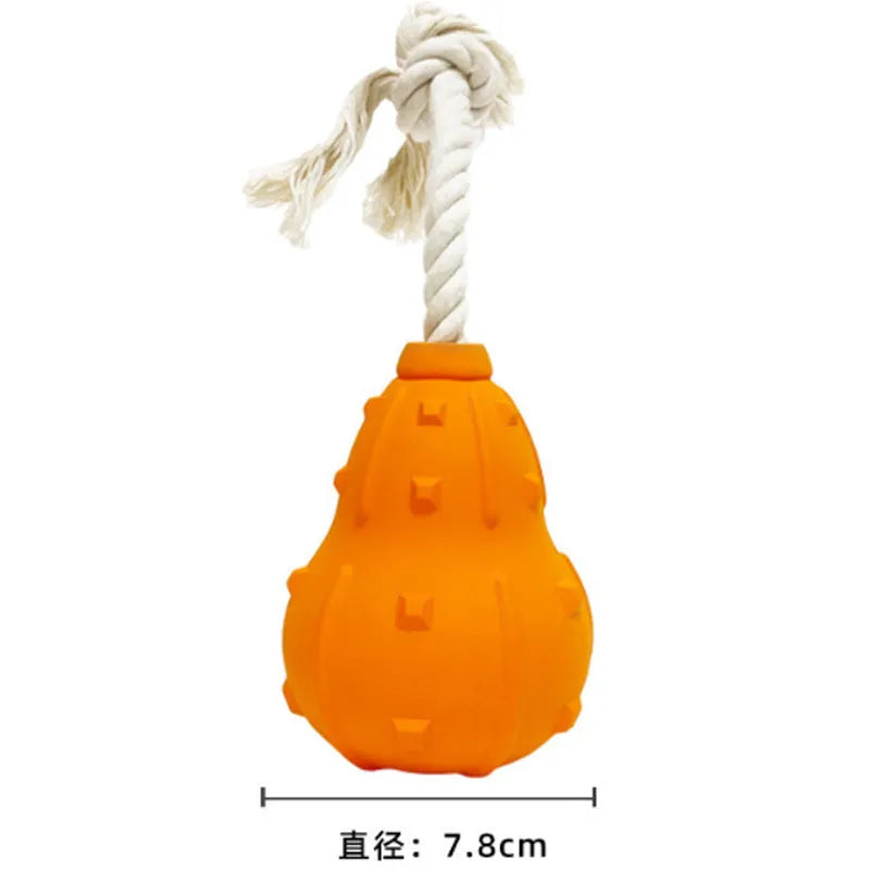 Natural rubber stuffable dog chew toy with a long strap for fetching and treat dispensing.