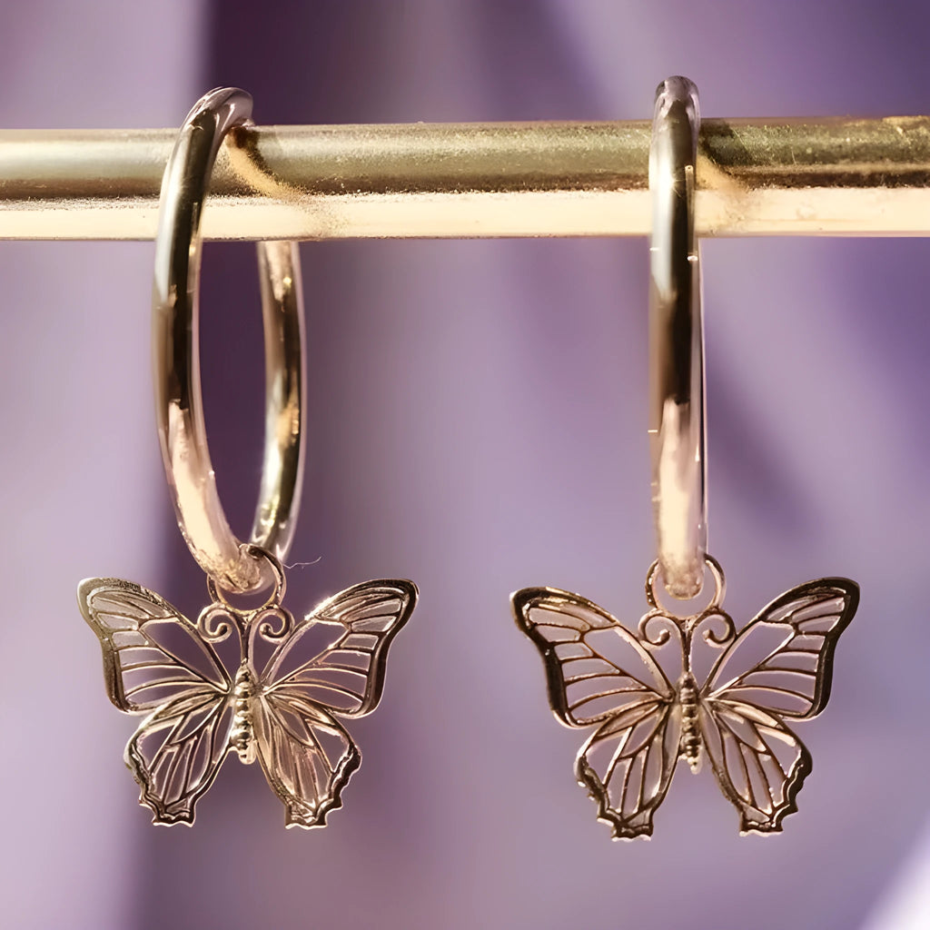 Gold and rose gold butterfly bow stud earrings, electroplated finish on copper alloy base