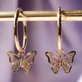 Gold and rose gold butterfly bow stud earrings, electroplated finish on copper alloy base